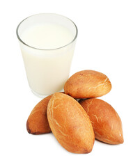 Obraz premium Delicious homemade patties and glass of milk isolated on white