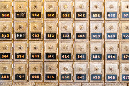 USA, CA, Petaluma.  Brass postal boxes in old post office.