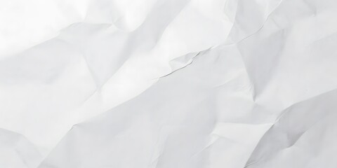 Fototapeta premium Close-up shot of a crumpled piece of white paper showing texture and folds
