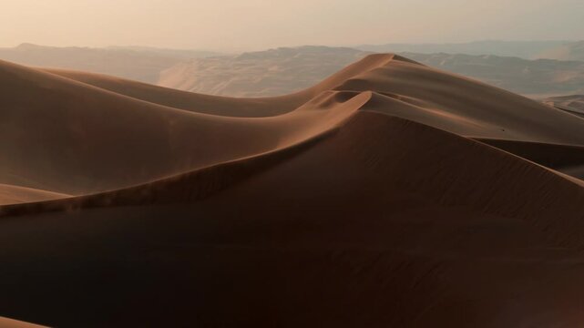 Golden Sand Dunes Under Soft Light