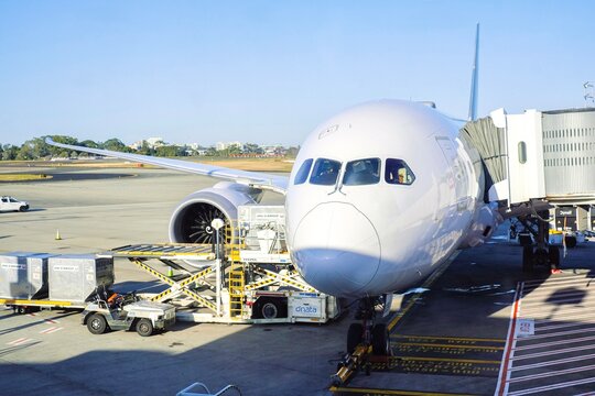 Sydney, Australia - 19 July, 2025: A JAL (Japan Airlines) plane waiting to board passengers on a sunny winter morning at Kingsford Smith International Airport, New South Wales