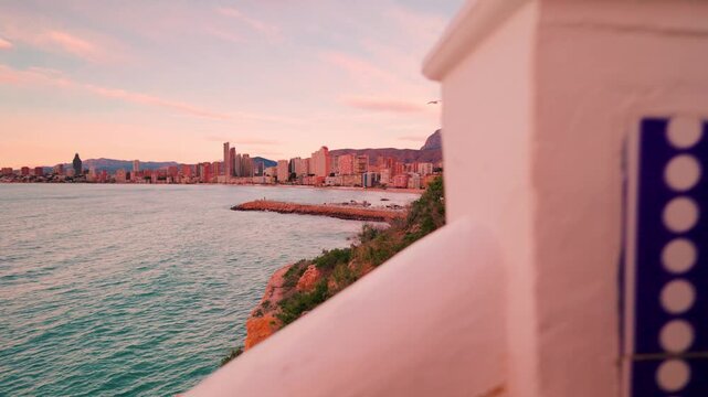 Scenic view of benidorm skyline at sunset from a balcony