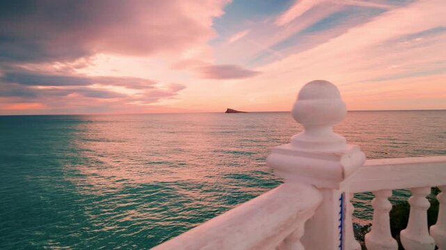 Walking along benidorm balcony of the mediterranean at sunrise