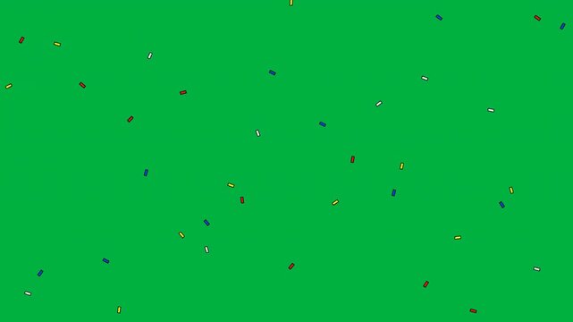 A vibrant green background scattered with multicolored shapes resembling confetti or candy