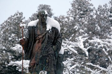 Obraz premium Statue of Monk Shodo Shonin in front of Rinnoji temple at Tosho-Gu, Nikko, Japan