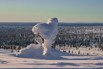 Hiking to the summit of Mount Kiilopää during a spectacular arctic sunset in Finnish Lapland. © julen