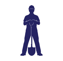 Obraz premium Silhouette of a construction worker holding a shovel in a standing position