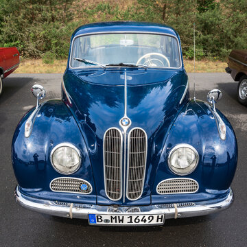 LINTHE, GERMANY - JUNE 08, 2025: The elegant blue luxury sedan BMW 501 "Barockengel" from the late 1940s early 1950s. Die oldtimer show.