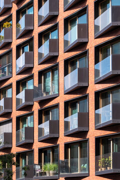 Abstract architecture detail of modern building facade where windows form a grid pattern with urban texture and strong geometry in view