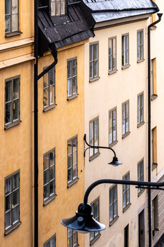 Rooflines shutters and gables highlight historic urban architecture on a street with Sodermalm facade in Stockholm Sweden and Scandinavia building texture