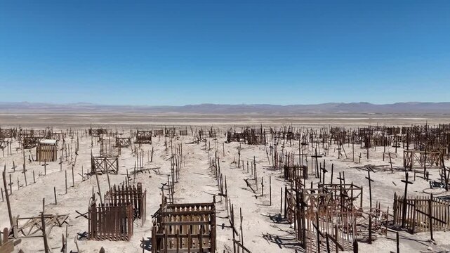 Pampa Union abandoned cemetery in Atacama Desert. Hundreds of wooden crosses in a ghost town graveyard.