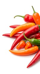 ​A collection of organic spicy peppers featuring smooth skins and vibrant tones isolated on a plain white setting.