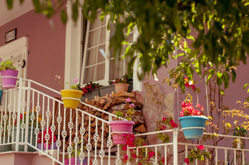 Kemer, Turkey, June 10 2010: A charming staircase adorned with colorful flower pots, blending beauty with a touch of whimsy