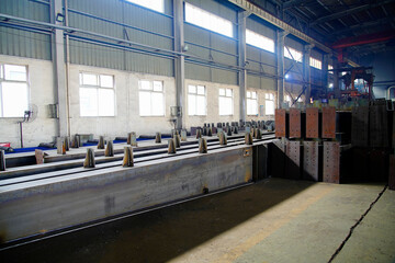 Obraz premium Steel structure processing in heavy industry factory