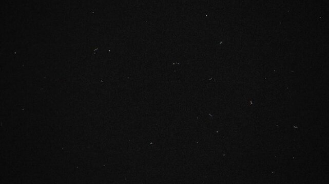 Dark starry night sky animation with twinkling stars creating depth and vastness