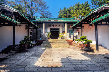 Obraz premium Guangzhou сity, Guangdong, China. Wuxian (Five Immortals)Temple. Stone statues, arches, bell tower and numerous elements of the Lingnan style make up this unique ancient architectural complex