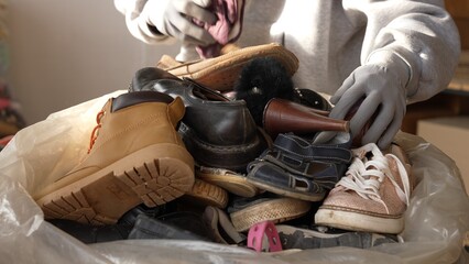 Volunteers sorting donated footwear for community aid