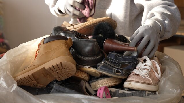 Volunteers sorting donated footwear for community aid