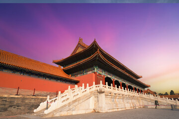 Fototapeta premium The Chinese Forbidden City in the evening and the beautiful sunset glow.