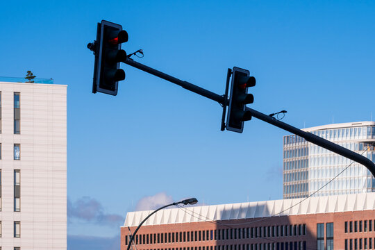 Urban street intersection under clear sky with Traffic Light signal illustrating city control infrastructure during daylight hours today