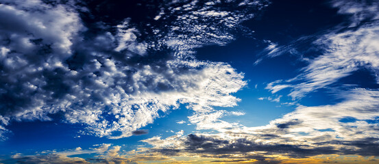 Dramatic sunset in the Sky through cumulus storm clouds,. Awesome epic landscape. Amazing vibrant colors, in Brazil