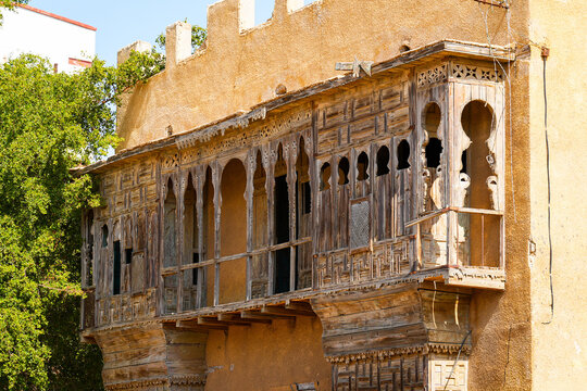 Intricate wooden roshan balconies in the historic Al-Balad district of Yanbu, Saudi Arabia