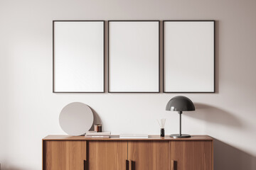 Blank framed posters in modern interior setting on light wall background showing clean layout concept for creative display and template use, 3D Rendering © ImageFlow