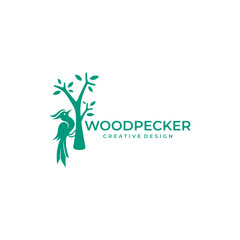 logo of a woodpecker pecking a tree above, green color