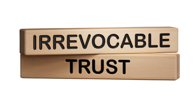 Text IRREVOCABLE TRUST writing in Wooden blocks. Business concept. Wooden cube blocks. Copy space.Supports PNG files with transparent backgrounds.