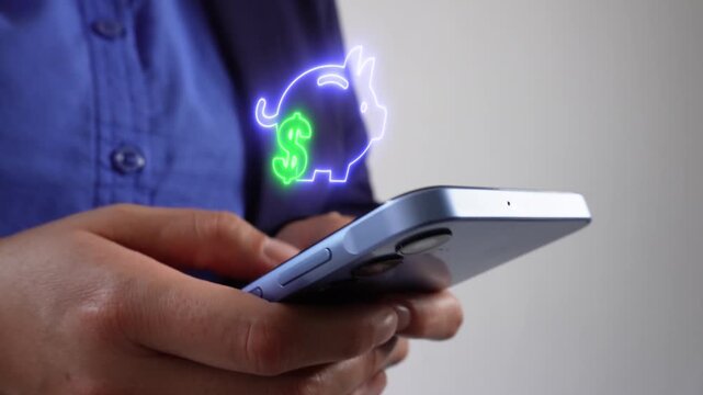 Financial planning and savings. Professional businesswoman checking her mobile phone with a virtual piggy bank icon and money symbol.