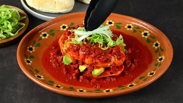 Placing sliced ​​onions on top of a chancla poblana or Mexican pambazo, Mexican Food