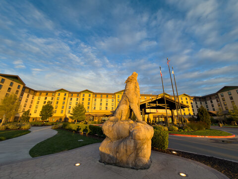 Great Wolf Lodge Resort Exterior with Howling Wolf Statue at Sunset