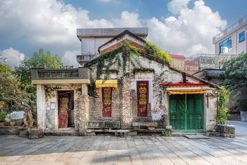 Obraz premium Foshan city, Guangdong, China. Shunde Beijiao Taocun Village has a history of more than 800 years, still preserves ancestral halls and rustic houses, showing the lingering charm of history.