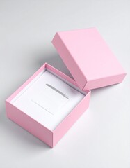 Open and closed pink realistic cardboard box with paper and a sticker on a light background. The concept of business gifts. Mock up. 