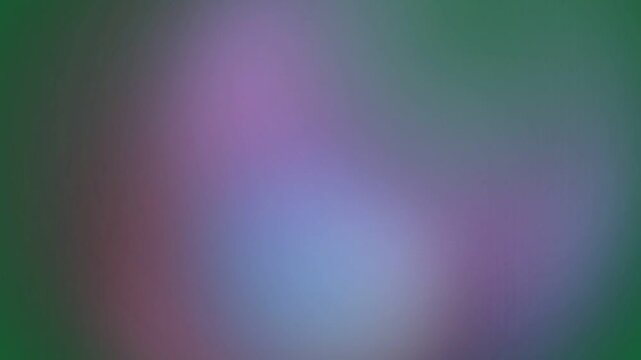 Close-up of colorful bokeh lights on a dark green background