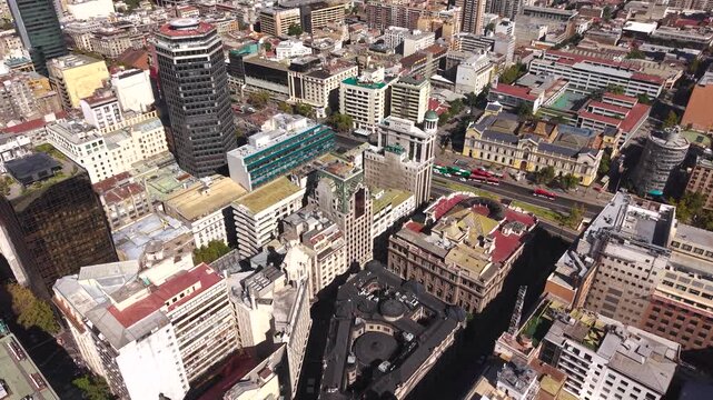 High-altitude drone view revealing Santiago layout and surrounding metropolitan landscape for editorial and tourism visuals. Chile, 4K