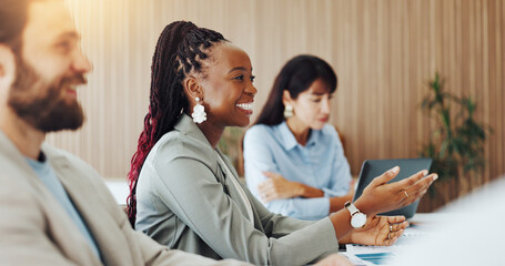 Attention, audience and meeting with business woman in boardroom for development or education. Listening, smile and workshop with corporate employee at table in office for seminar or upskill training