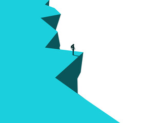 businesswoman stands on the edge of a cliff © Yoona