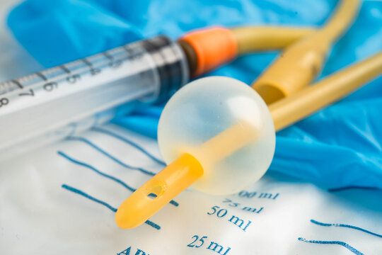 Foley catheter and urine drainage bag collect urine for disability or patient in hospital.