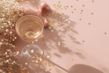 A chic glass of sparkling drink surrounded by confetti and flowers creates a charming scene Generative AI