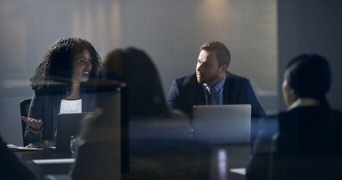 Laptop, woman or team with meeting in boardroom for financial review, budget approval or feedback. Directors, people or discussion with tech in office for risk management, investor update or planning