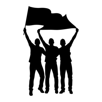 Silhouette of three people holding a large flag.