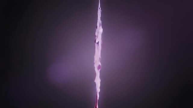 Vibrant Purple And Pink Maple Leaf With Water Droplets Illuminated Against Dark Moody Background Minimalist Nature Detail