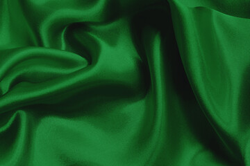 Obraz premium Green emerald fabric texture background, detail of silk or linen pattern.