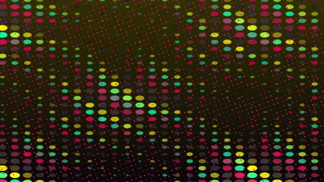 Abstract dot pattern with varied color oval shapes, small pink circles on a dark background