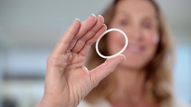 Female Doctor Holding Vaginal Contraceptive Ring