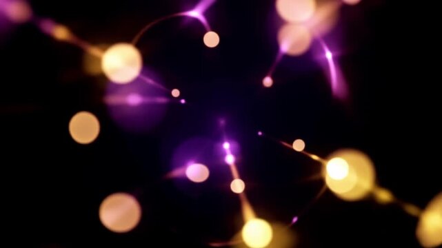 A mesmerizing display of colorful, out-of-focus lights against a dark background, creating a sense of depth and texture