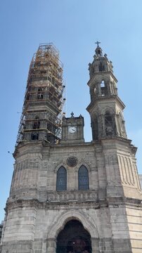 Tepic cathedral with scaffolding under construction, vertical exterior