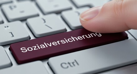 Macro Close-up of a Finger Pressing a Maroon "Sozialversicherung" Keyboard Key on a Light Grey Modern Keyboard for German Social Insurance and Security