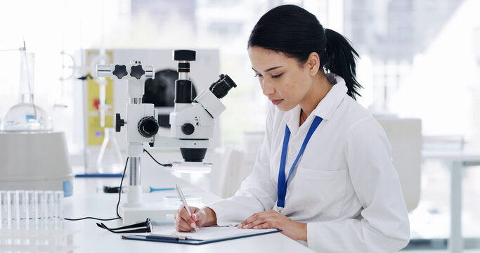 Woman, writing and notes on clipboard at laboratory with progress report, medical research and virus cure. Person, pharmaceutical study and documents for checklist, admin and vaccine development